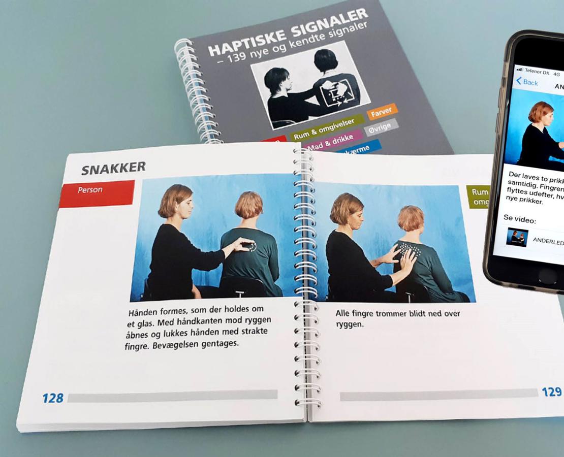 Bog og app med haptiske signaler